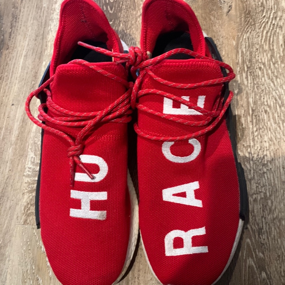 Human race adidas shoes, color red size 11. Mildy worn.
